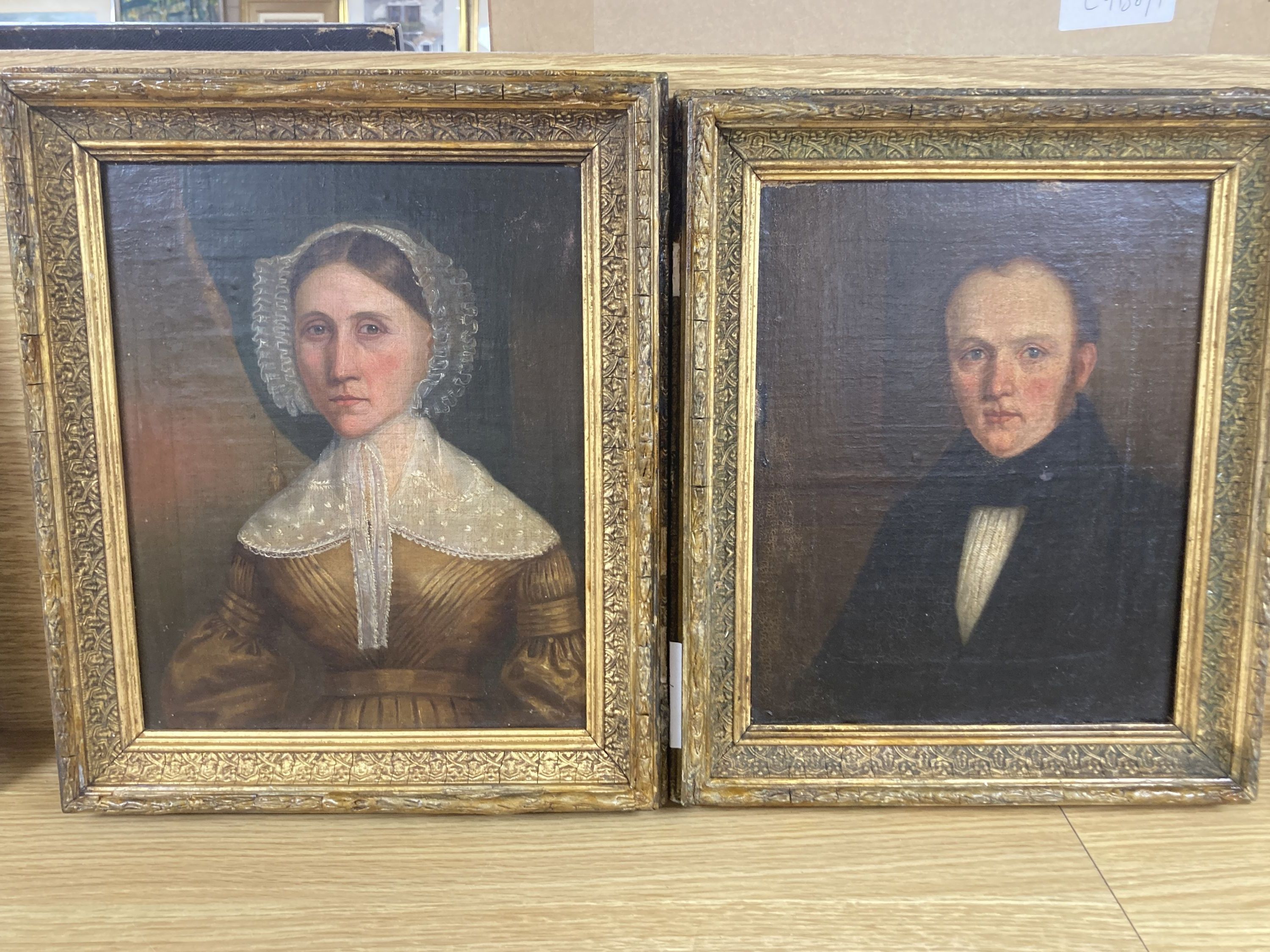 English School c.1840, pair of oils on canvas laid on board, Portraits of a husband and wife, 26 x 20cm